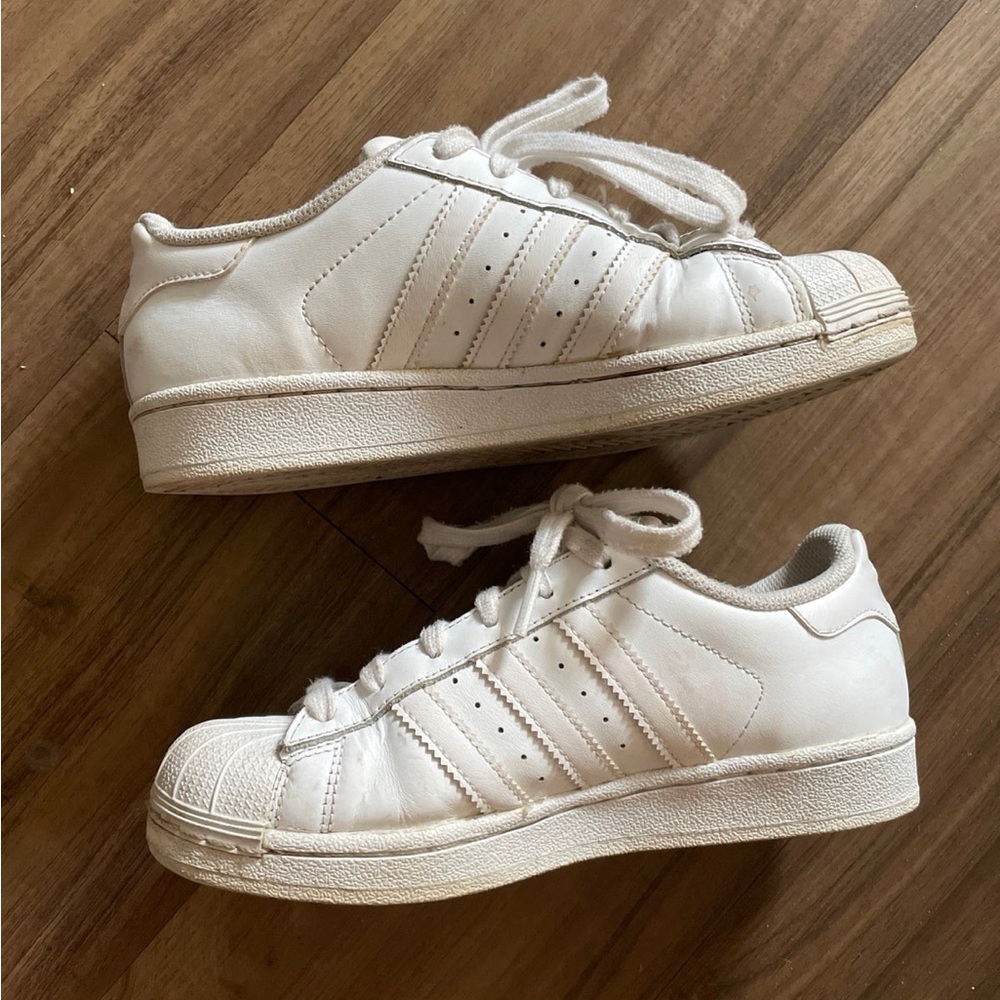 White Adidas Superstars